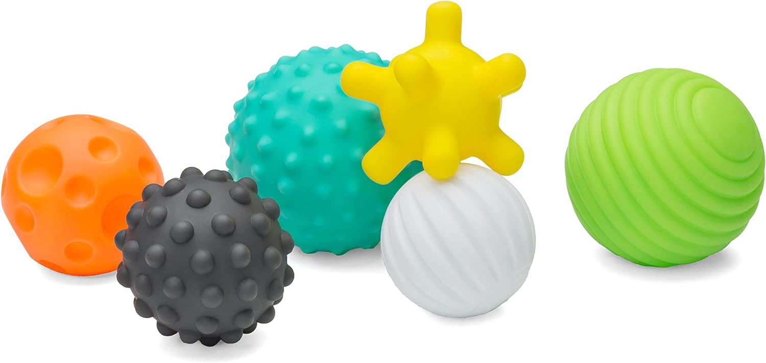 Group of multi-textured balls different shapes and sizes